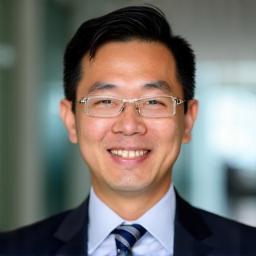 Professional headshot of Alex Chen
